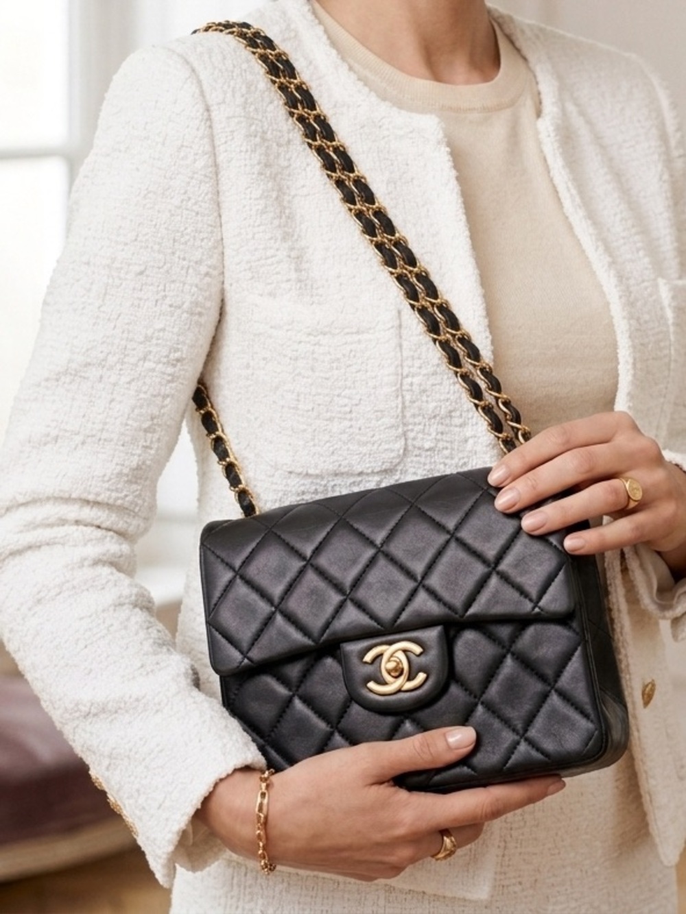 CHANEL Black Quilted Leather Crossbody with Gold Chain